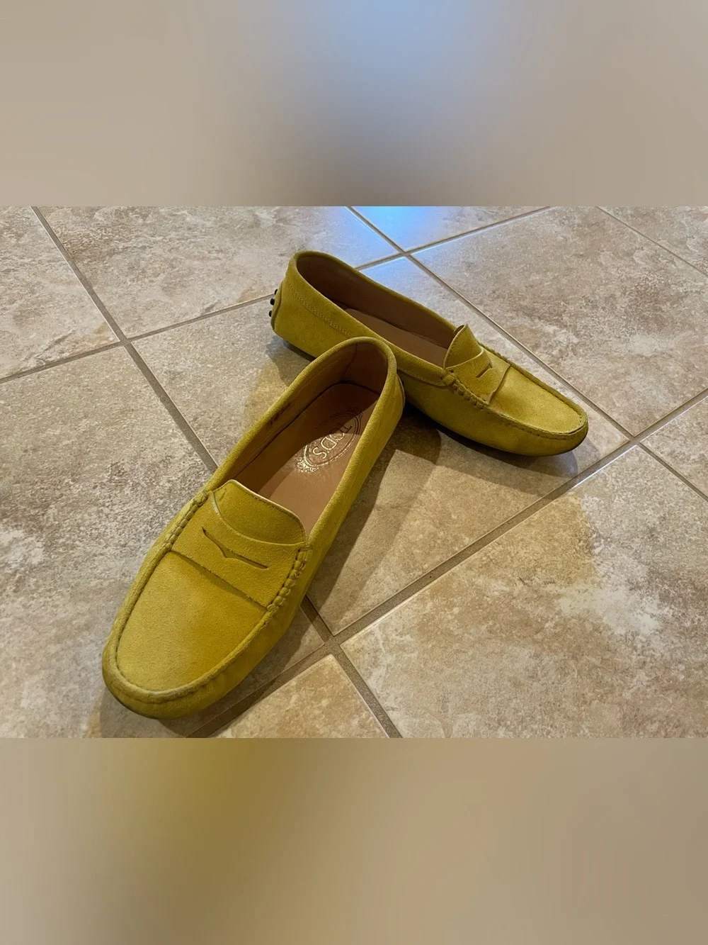 Tod’s Gommino Penny Loafers in Yellow